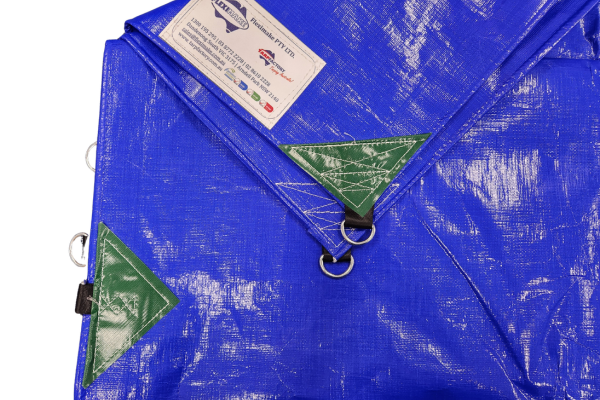Waterproof 260GSM PE tarpaulin folded with strong D-ring for secure fastening