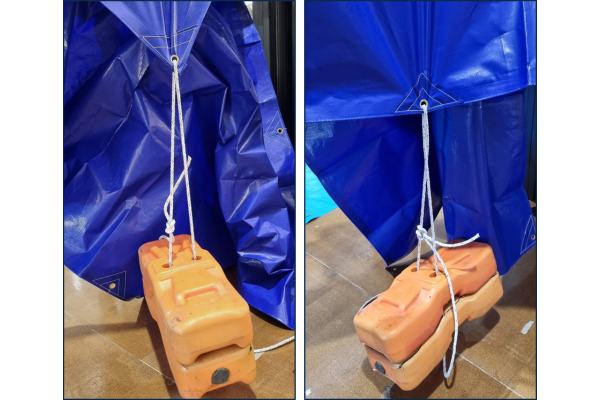 Durable tarpaulin eyelet and rope under tension showing tear resistance