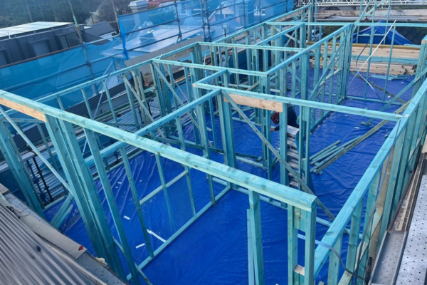 320GSM PE tarpaulin laid on upper floor slab of building under construction