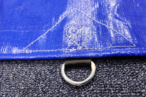 Industrial 320GSM PE tarp flat edge with reinforced D-ring tie-down point